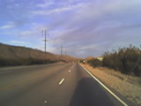 [Photo: open road ahead]